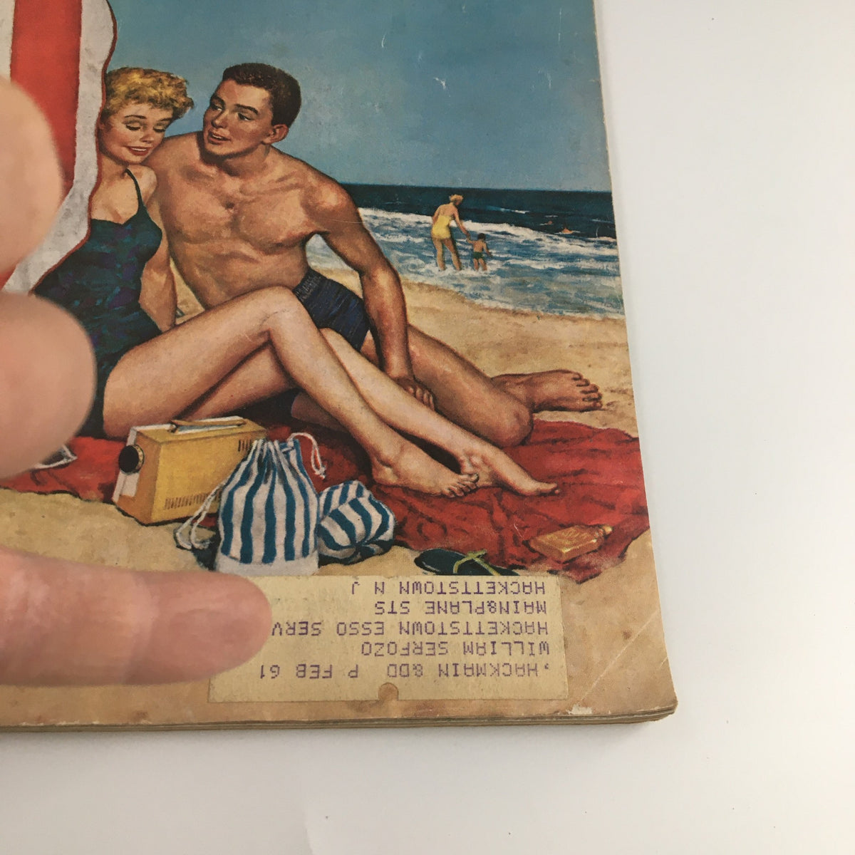 Close-up view of The Saturday Evening Post August 13, 1960 cover, focusing on Gina Lollobrigida with a beach setting and vintage summer attire.
