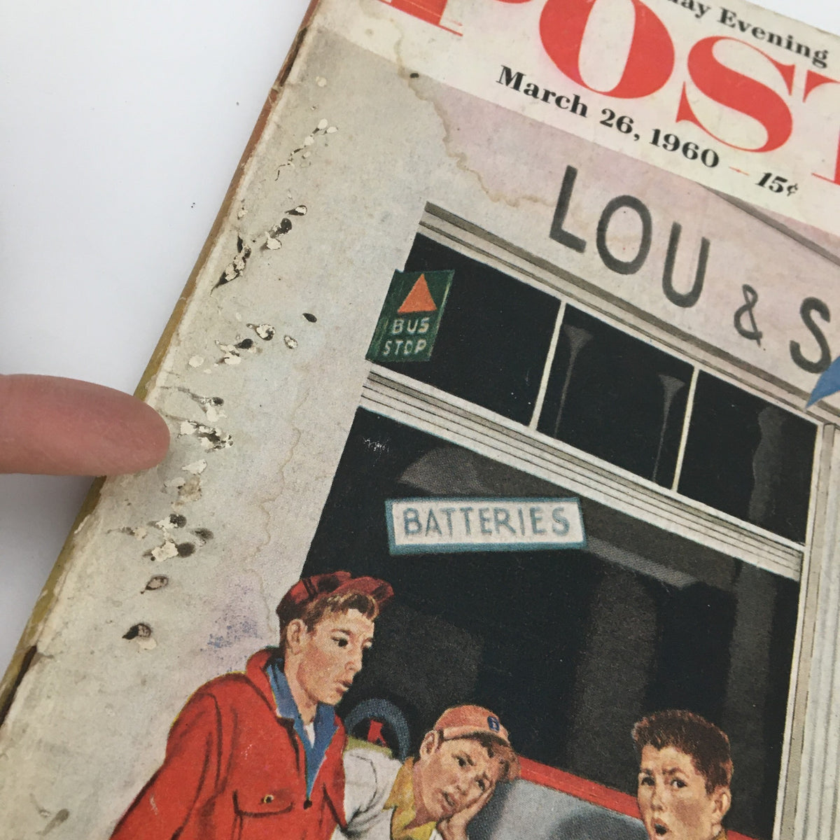 Detailed view of the edge of The Saturday Evening Post March 26 1960 cover highlighting wear and tear, part of the nostalgia surrounding I Call On Debbie Reynolds by Pete Martin.