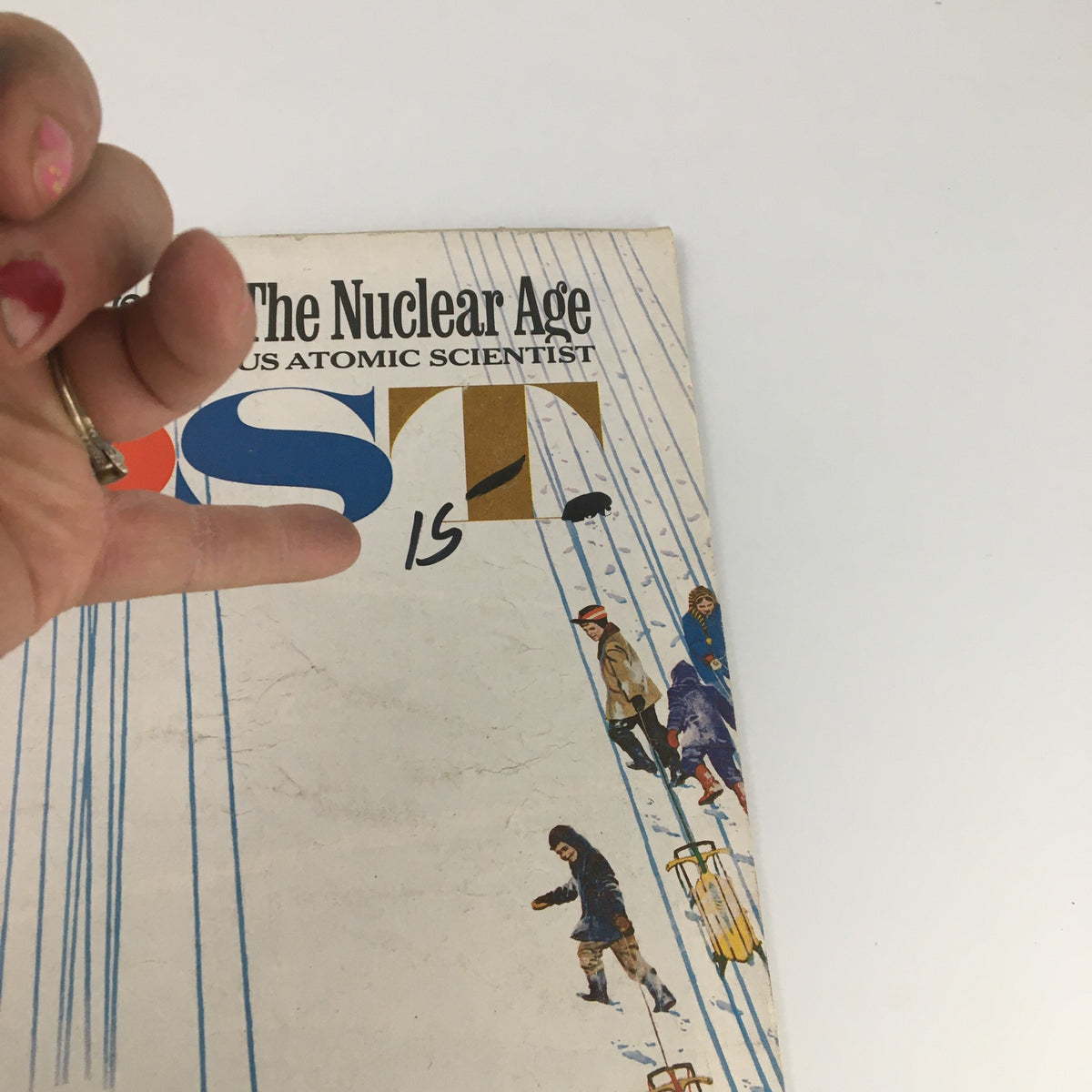 Close-up of the cover of The Saturday Evening Post February 3, 1962, highlighting the title 'A Plan For Survival in The Nuclear Age' and vivid illustrations of people enjoying winter activities.