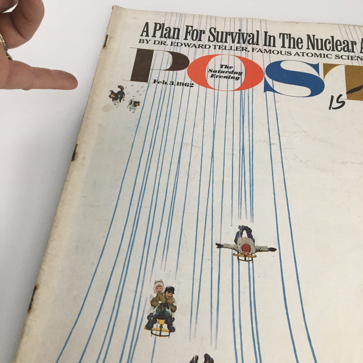 Cover of The Saturday Evening Post dated February 3, 1962, featuring an article titled 'A Plan For Survival in The Nuclear Age,' highlighting illustrations of children sledding and playful imagery, showcasing vintage magazine design.