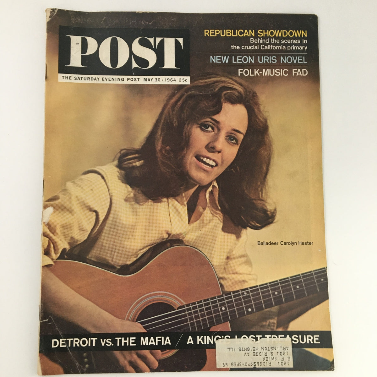 Vintage cover of The Saturday Evening Post from May 30, 1964, featuring balladeer Carolyn Hester with an acoustic guitar, highlighting cultural themes of the 1960s and folk music revival.