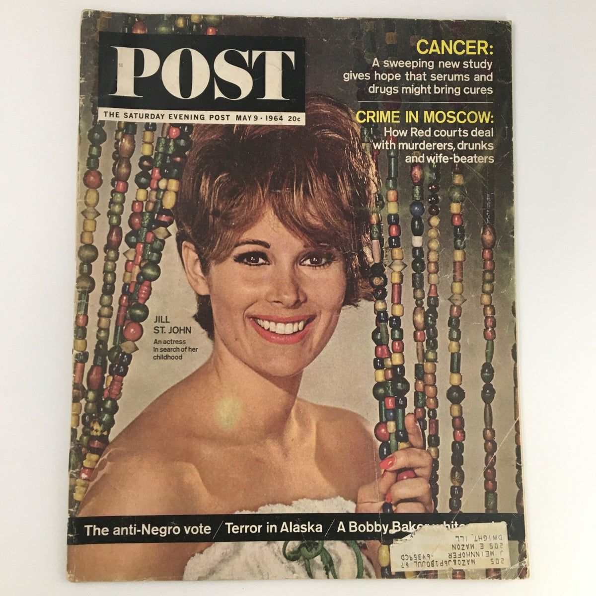 Cover of The Saturday Evening Post, May 9, 1964, featuring actress Jill St. John. The magazine showcases vintage cultural insights and includes articles on contemporary issues of the era.