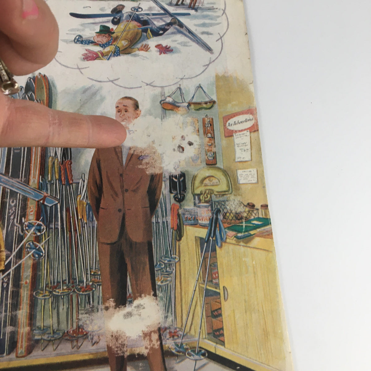 Illustration from The Saturday Evening Post March 4 1961 showing a man in a suit standing amidst skiing equipment, with a thought bubble featuring a skier.