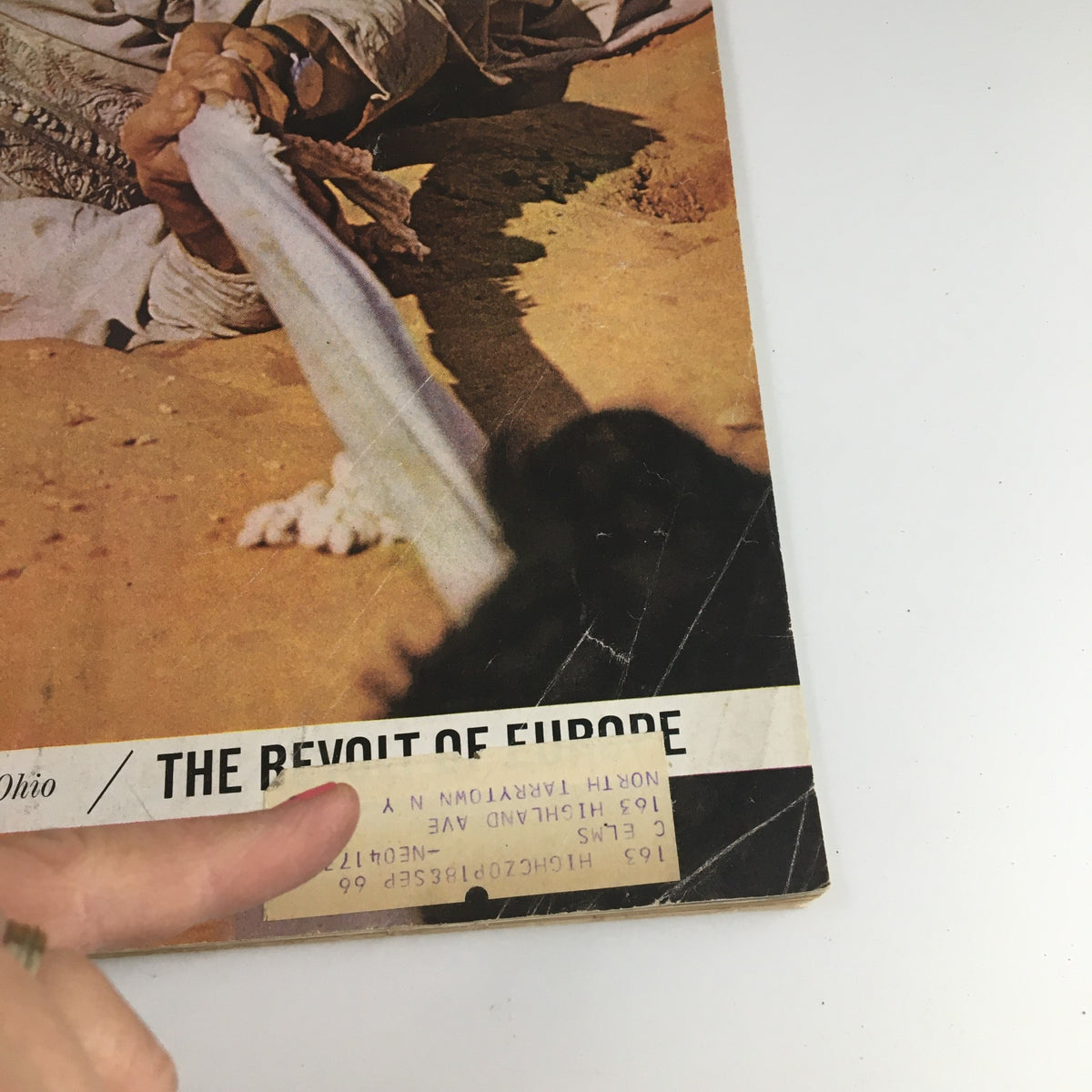 Close-up of the edge of The Saturday Evening Post cover from March 9, 1963, with a focus on the address label and minor wear details, showcasing the magazine's vintage condition and era.