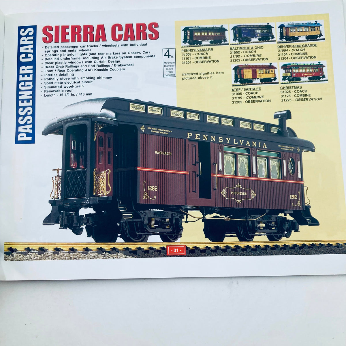 2002 - 2003 Aristo-Craft Trains Catalog The Transit System featuring a visual of passenger cars including the Pennsylvania model, illustrating vintage train designs with detailed descriptions for collectors and train hobbyists.