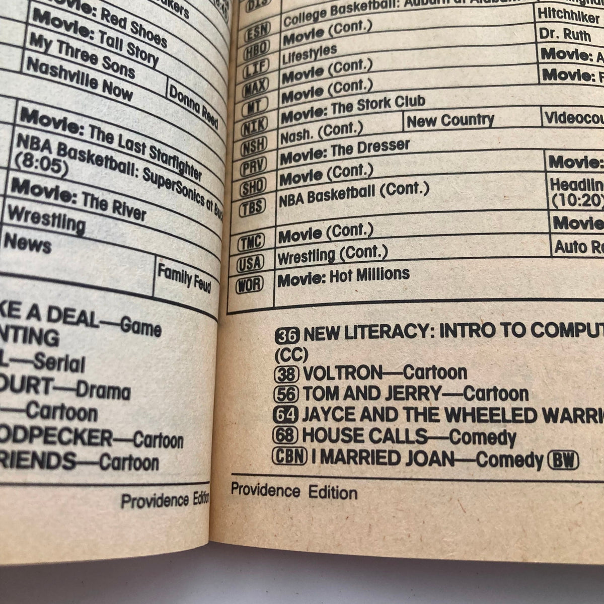 Inside page of TV Guide Magazine December 7 1985 displaying detailed TV listings, featuring shows like 'Voltron' and 'Tom and Jerry', capturing the programming highlights from the mid-80s.