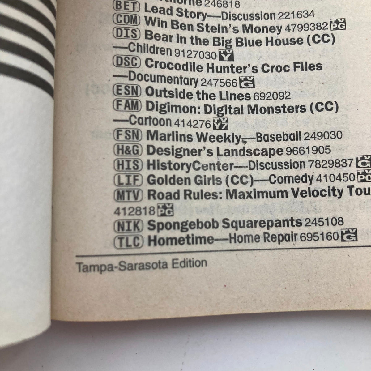 Inside page of TV Guide Magazine July 29 2000 showcasing TV listings including 'Crocodile Hunter's Croc Files', 'SpongeBob SquarePants', and 'Golden Girls'. Highlights Tampa-Sarasota edition details.