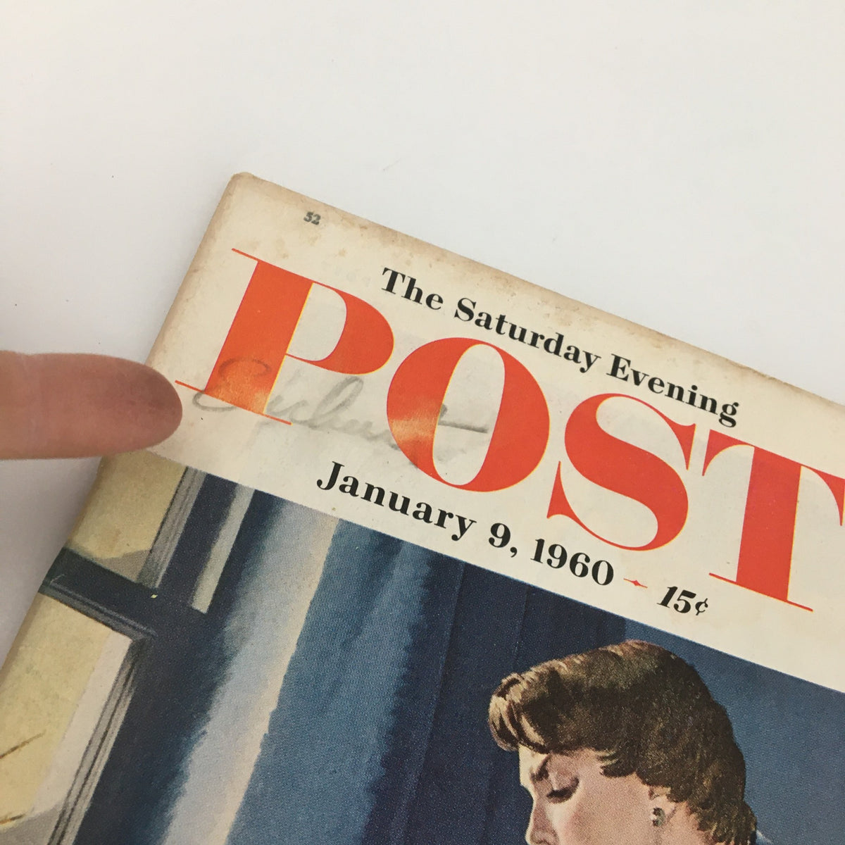 Close-up of the cover of The Saturday Evening Post January 9 1960 highlighting the title and date, with a faint handwritten note on the magazine's edge.