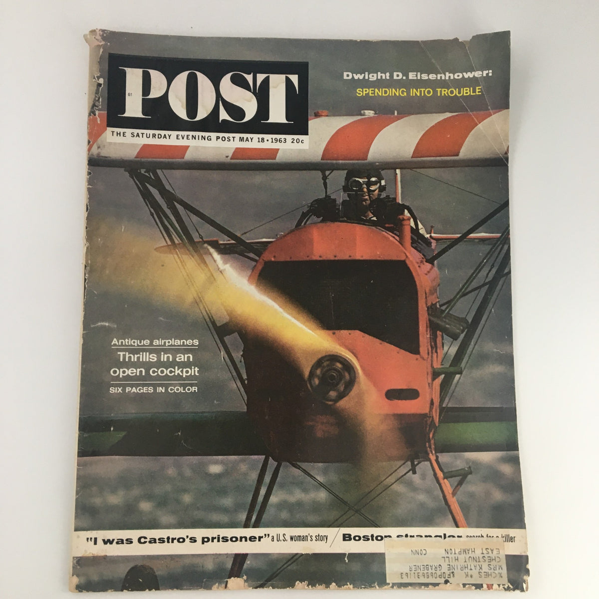 Cover of The Saturday Evening Post from May 18, 1963 featuring the title 'Spending Into Trouble' with a striking image of an antique airplane and a pilot, showcasing vintage magazine design.