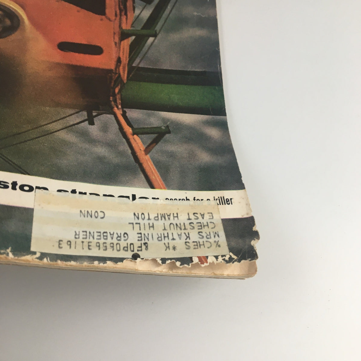 Close-up of the vintage magazine 'The Saturday Evening Post' dated May 18, 1963, highlighting the address label and wear typical of its age.