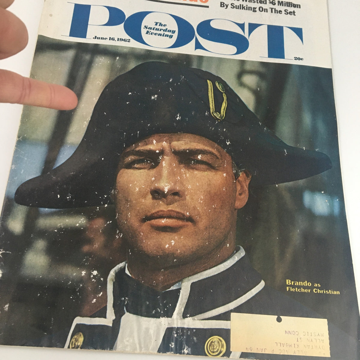 Close-up of The Saturday Evening Post June 16, 1962 cover with Marlon Brando as Fletcher Christian, highlighting details of Brando's costume and magazine wear.