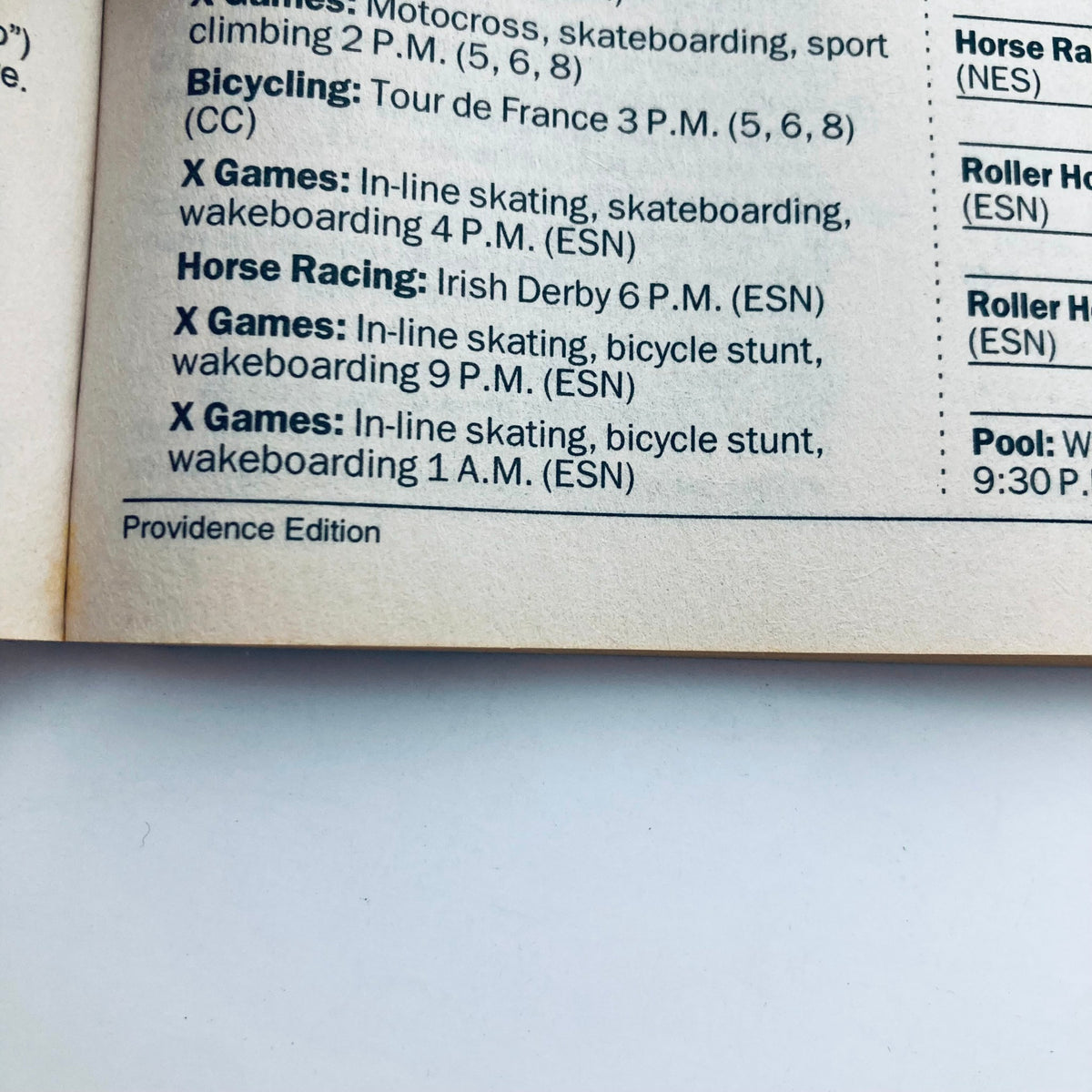 Inside page of TV Guide Magazine July 3, 1999 showing television listings, including events like the X Games and horse racing in the Providence Edition.