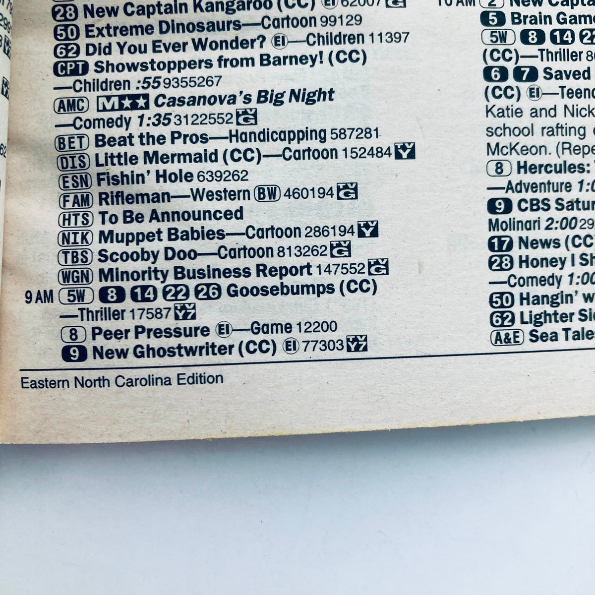 Interior page of TV Guide Magazine March 7 1998 displaying the Eastern North Carolina edition TV programming schedule, including listings for popular shows such as Scooby Doo and Ghostwriter.