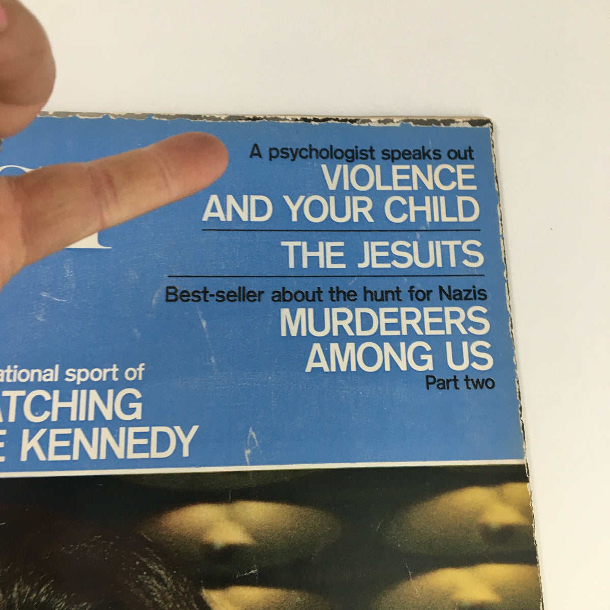 Close-up of The Saturday Evening Post March 11 1967 cover, displaying the article titles including 'Violence and Your Child' and 'The Jesuits,' alongside the prominent feature on Jackie Kennedy.