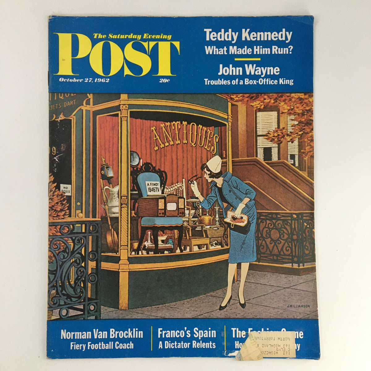 Cover of The Saturday Evening Post from October 27, 1962 featuring Teddy Kennedy and John Wayne, showcasing a vintage scene with a woman at an antique shop.