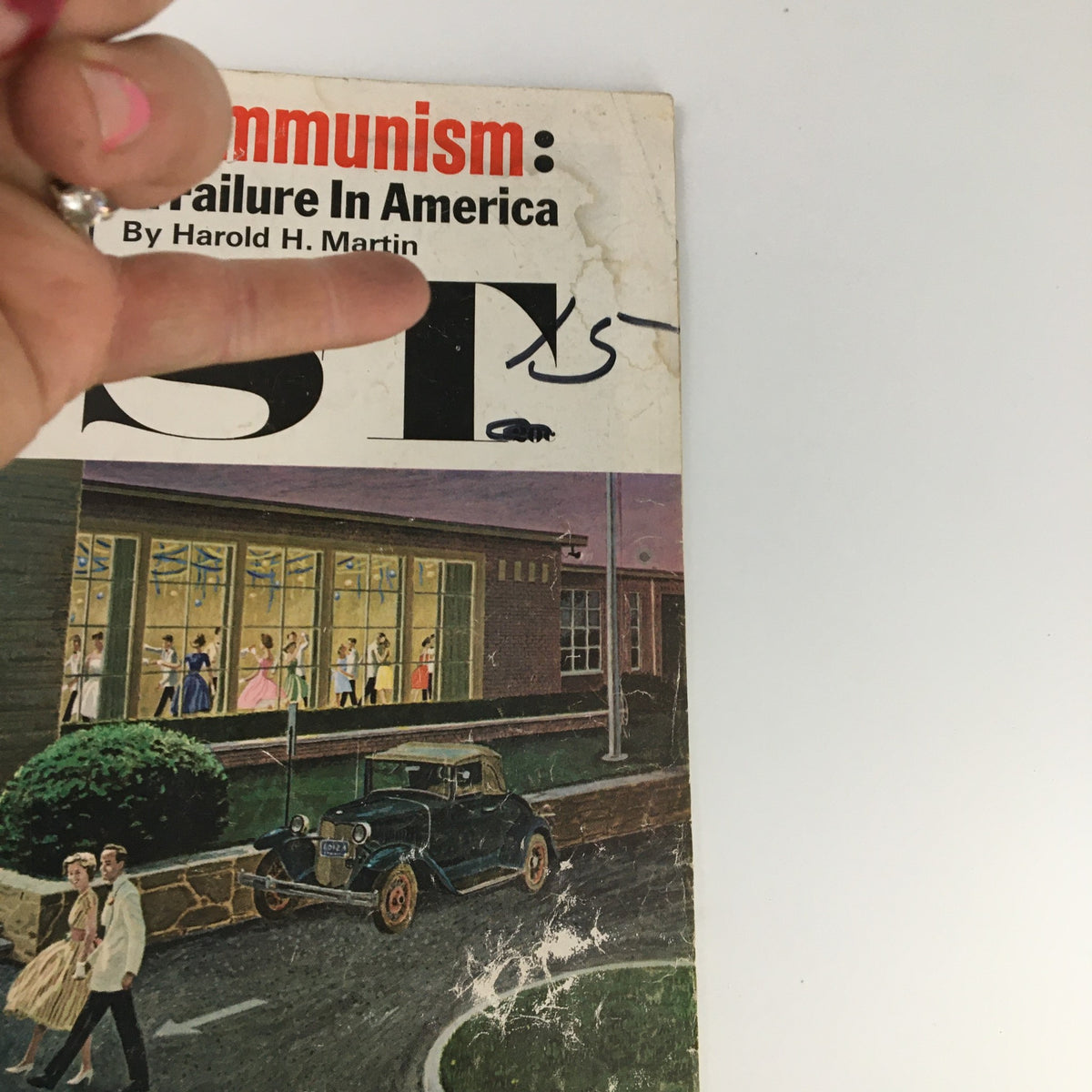 Close-up detail of the cover of The Saturday Evening Post May 19, 1962, highlighting the title 'A Failure in America' and vintage design elements.