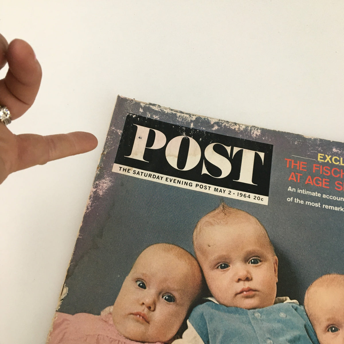 Close-up of The Saturday Evening Post May 2, 1964 cover, highlighting the title and a charming image of the Fischer Quintuplets at six months.