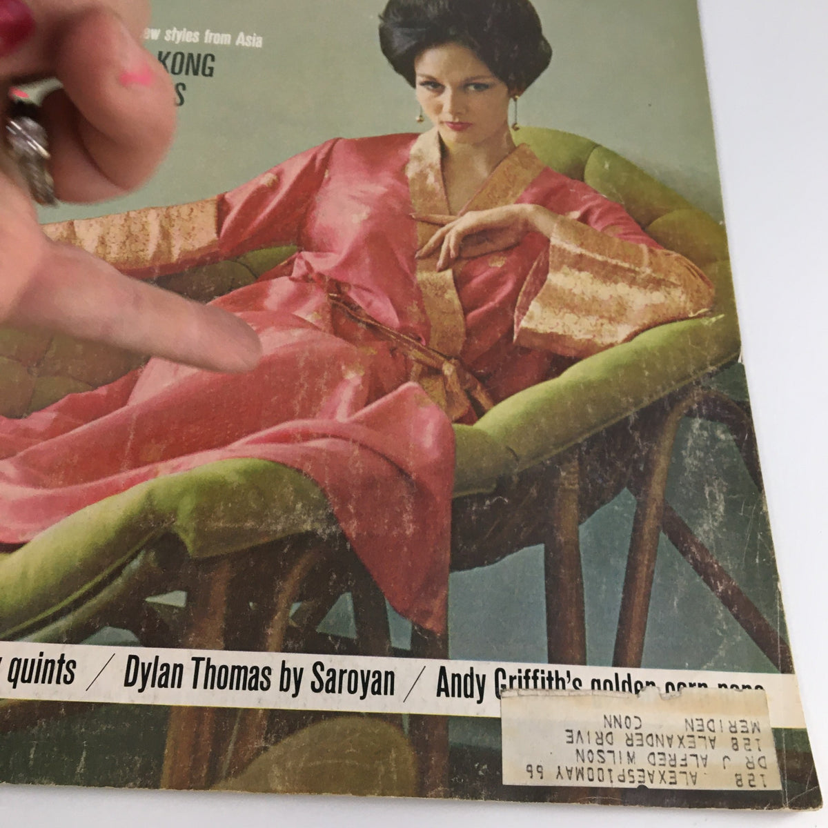 Close-up of The Saturday Evening Post January 25 1964 magazine cover showing a model in a pink robe, featuring articles on Dylan Thomas and Andy Griffith.