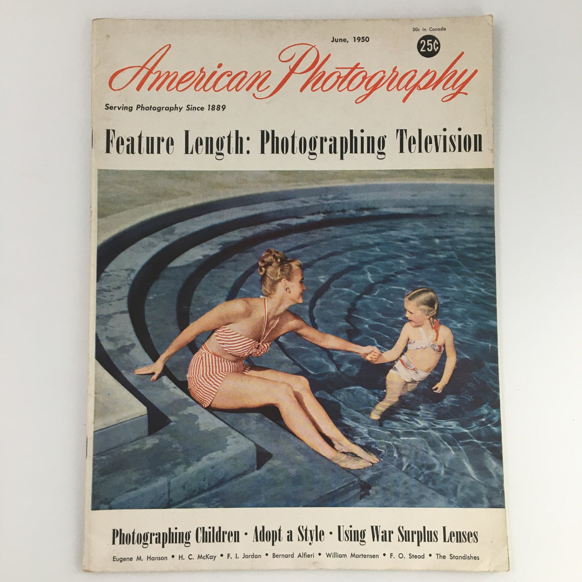 Cover of VTG American Photography June 1950 featuring a mother and child playing in a swimming pool, with emphasis on the theme 'Photographing Television' and tips on photographing children.