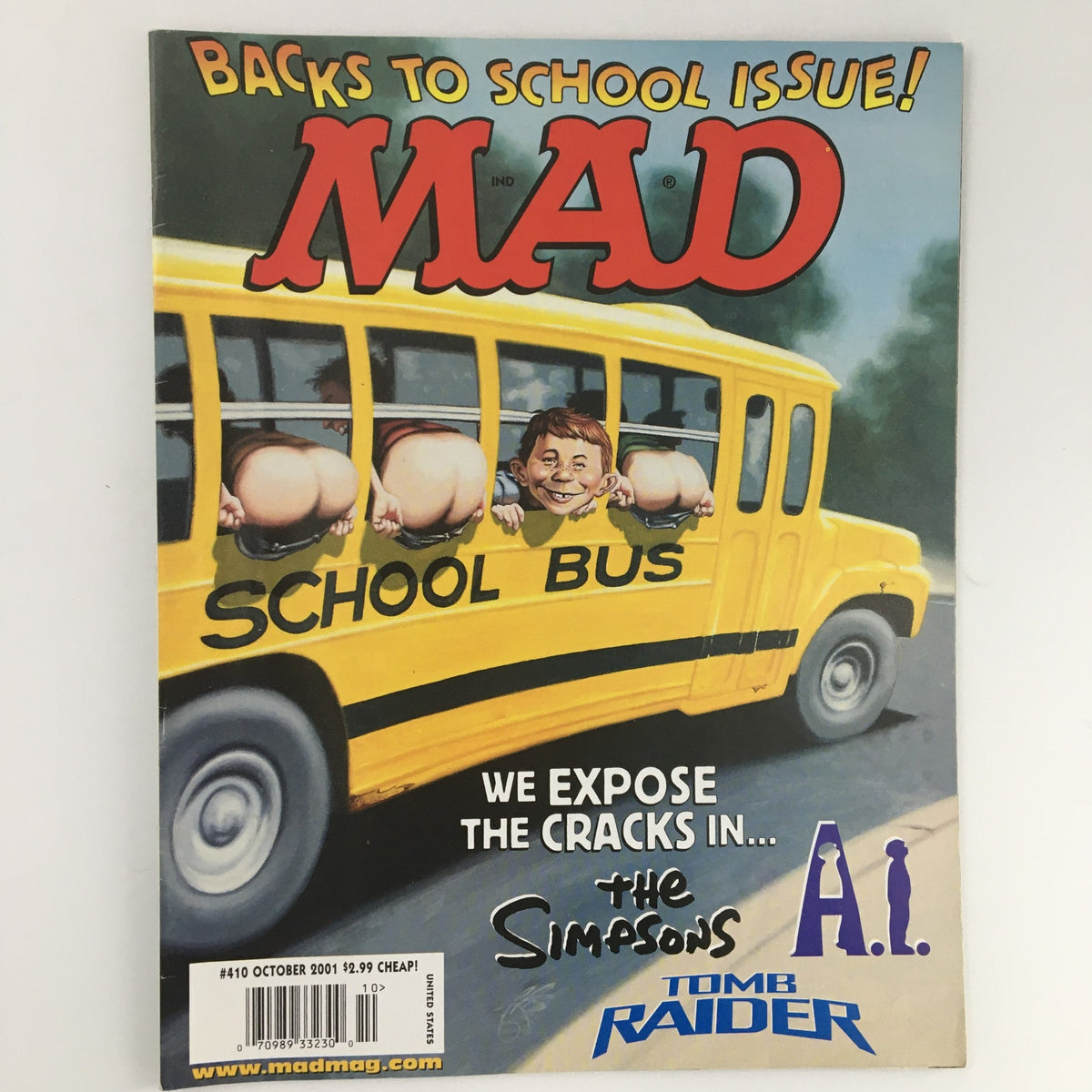 Cover of Mad Magazine, October 2001, Number 410, titled 'Back to School Issue!' featuring playful artwork of a school bus with humorous elements. Highlights include features on The Simpsons and Tomb Raider, making it a must-have collectible for fans of early 2000s pop culture.