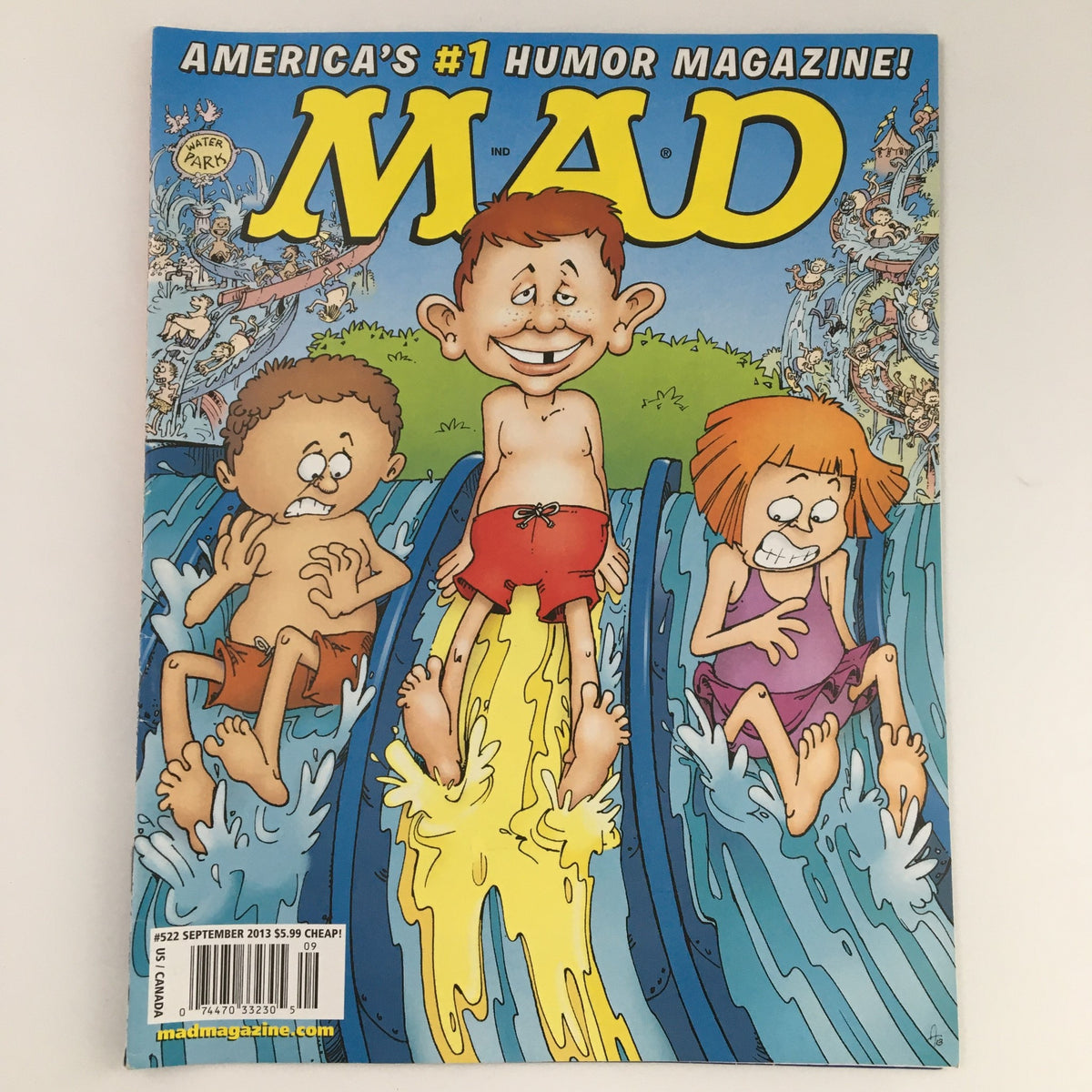 Mad Magazine September 2013, Issue #522 cover featuring playful cartoon children on water slides, showcasing the magazine's signature humor and iconic style.