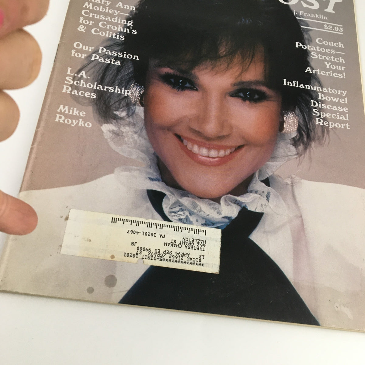 Cover of The Saturday Evening Post, January February 1994 featuring Mary Ann Mobley and Mike Royko. The magazine showcases a smiling female figure dressed in a black and white outfit, emphasizing a vintage style. Includes an address label on the front, indicative of its used condition.