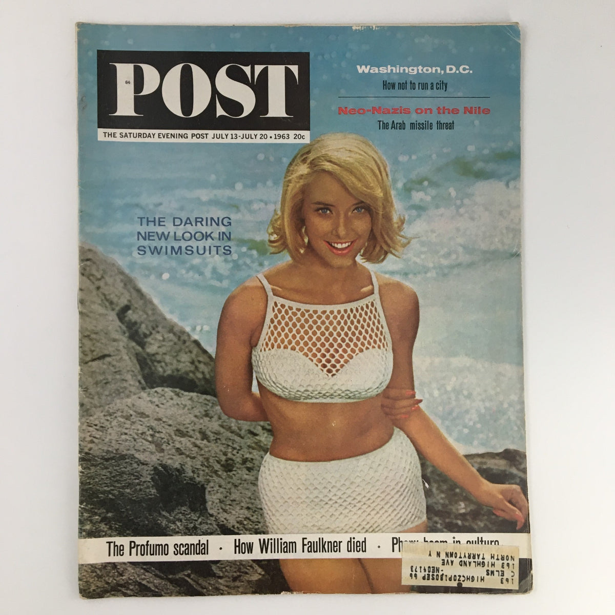 Cover of The Saturday Evening Post dated July 13-20, 1963, featuring a woman in a crochet swimsuit, highlighting the article 'Neo-Nazis on the Nile' alongside captivating topics like the Profumo scandal.