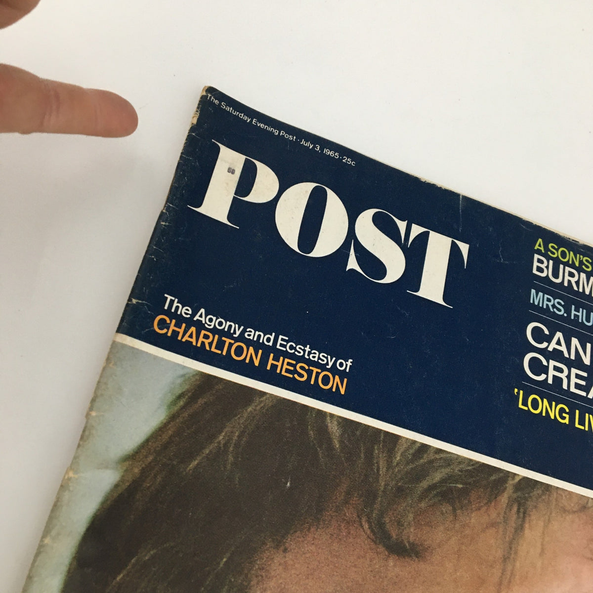 Close-up view of The Saturday Evening Post July 3 1965 cover highlighting the title and subtitle about the Agony and Ecstasy of Charlton Heston, emphasizing the magazine's nostalgic value and connection to film history.