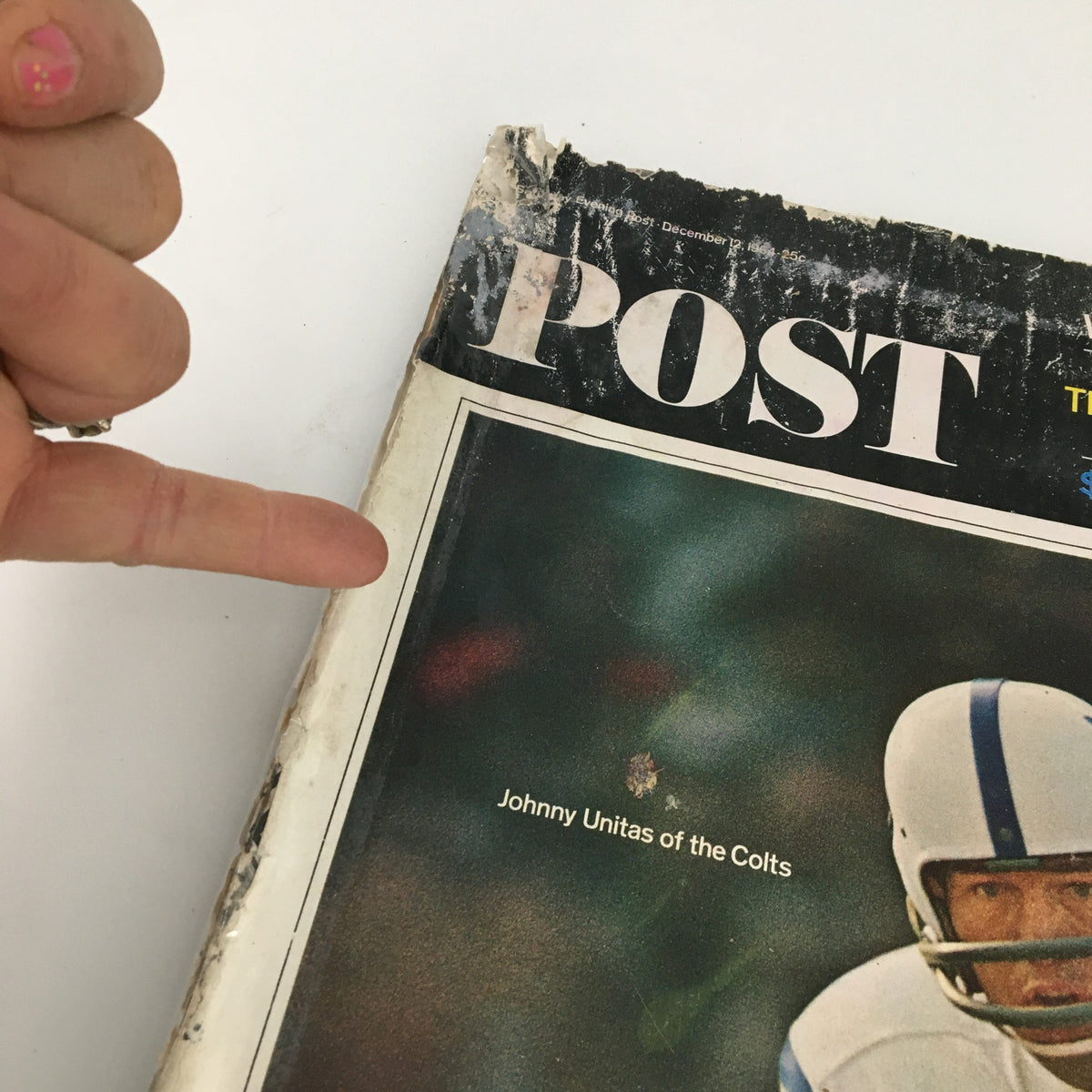 Detail of the cover of The Saturday Evening Post December 12, 1964, featuring Johnny Unitas of the Colts with magazine imperfections.