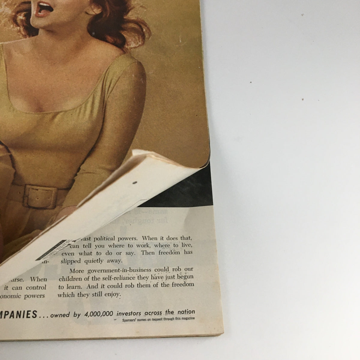 Side view of The Saturday Evening Post May 4, 1963, featuring Ann-Margret on the cover, with a partially opened page revealing internal content.