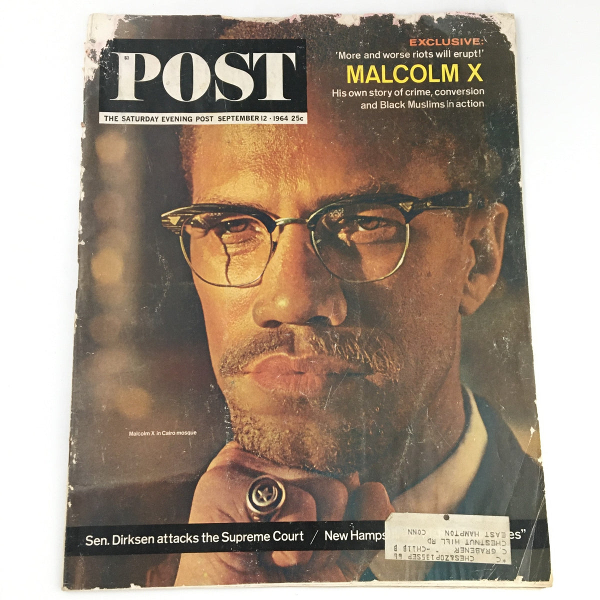 The Saturday Evening Post September 12 1964 cover featuring a close-up of Malcolm X, highlighting his intense expression and glasses, with the headline about riots and exclusive content on his life.