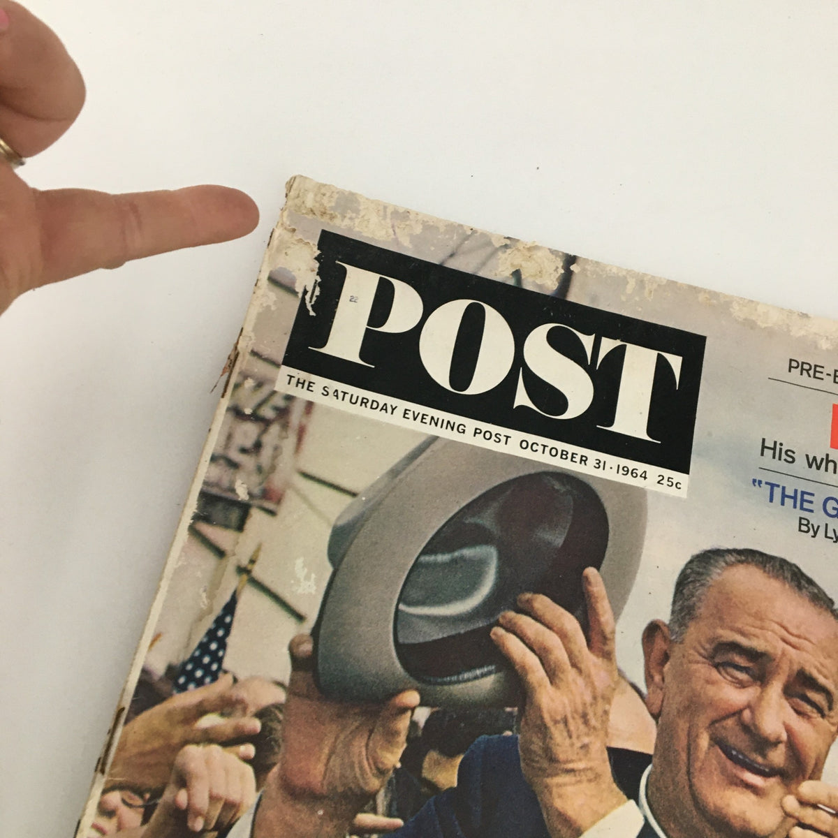 Close-up of The Saturday Evening Post October 31 1964 cover highlighting Lyndon B. Johnson and his campaign, showing wear and historical significance.