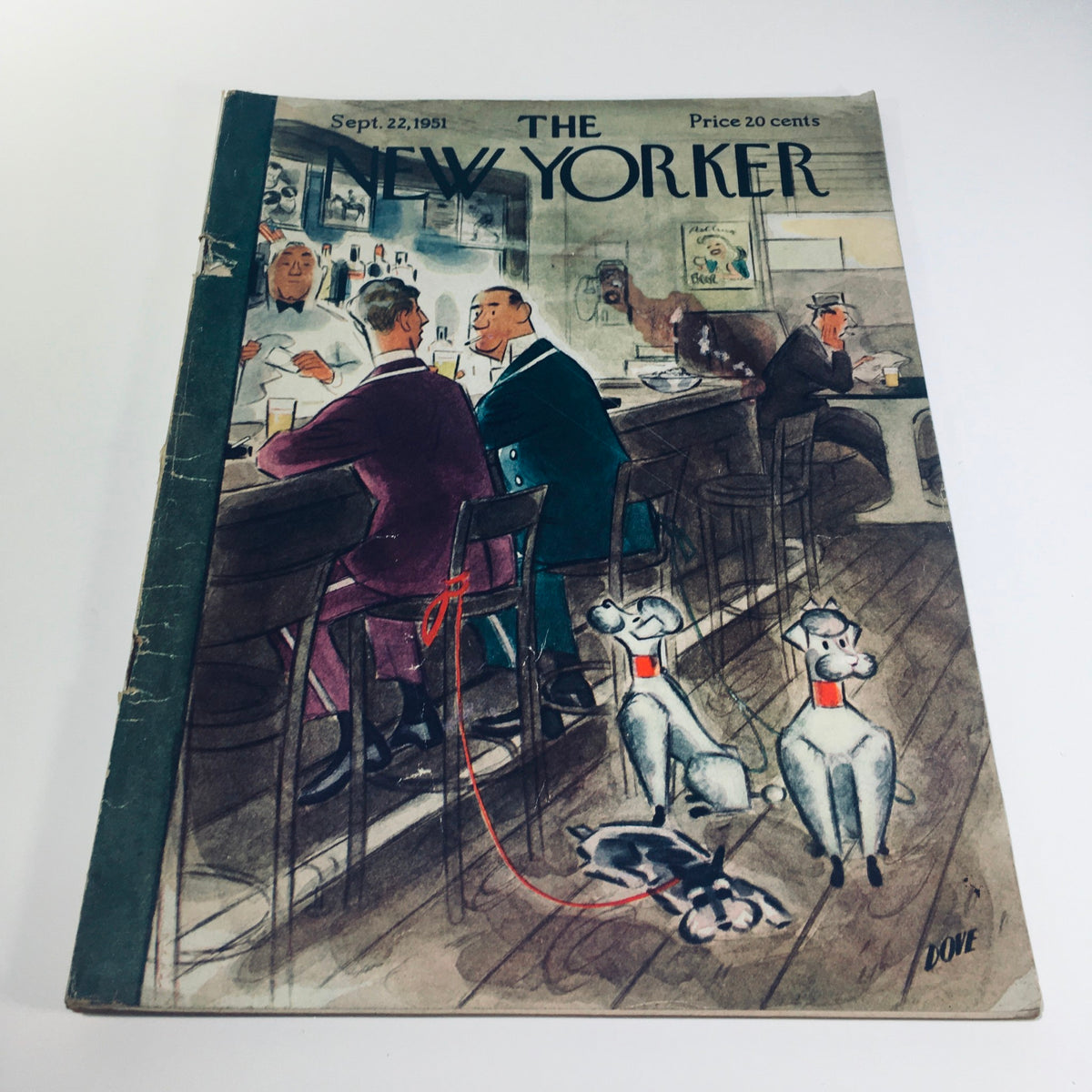 Cover of The New Yorker Magazine from September 22, 1951 featuring a playful illustration by Leonard Dove, depicting two men at a bar with dogs in a lively setting.