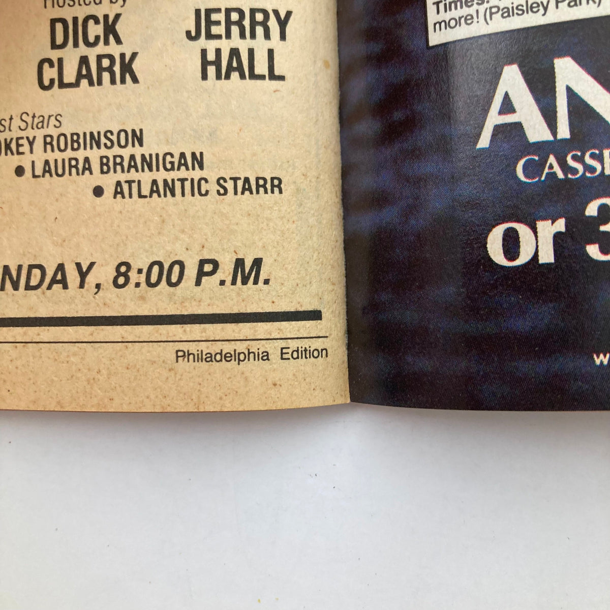 Inside page of TV Guide Magazine August 8, 1987, listing hosted by Dick Clark and Jerry Hall, showcasing featured stars including Smokey Robinson and Laura Branigan.
