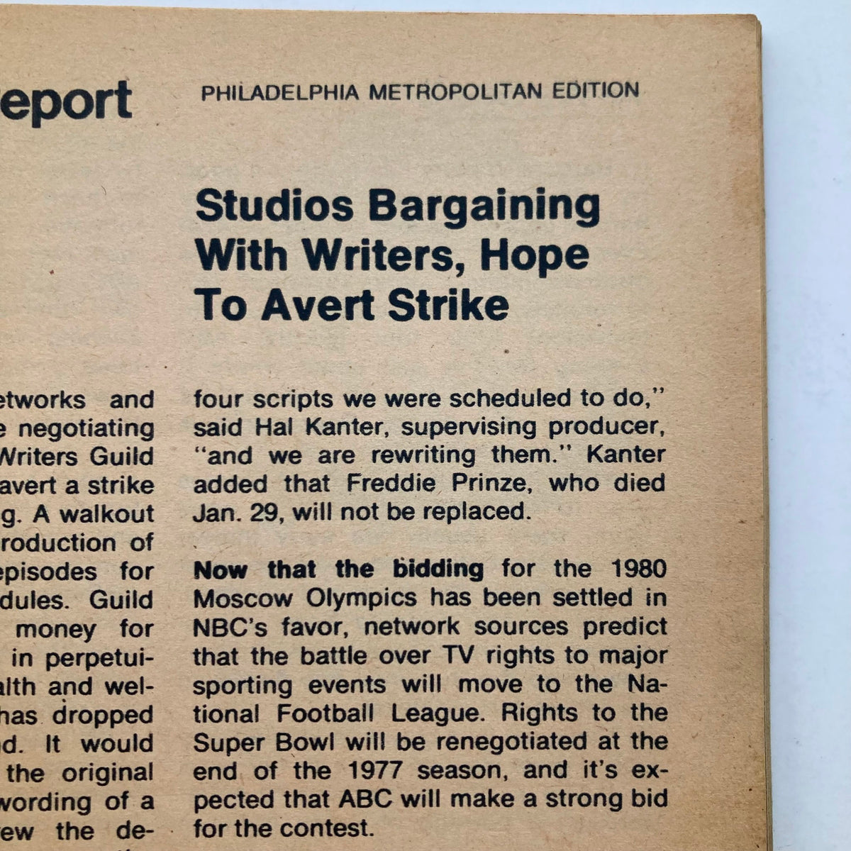 Inside page of TV Guide Magazine, Philadelphia Metropolitan Edition, reporting on studios negotiating with writers to avert a strike, including news about the 1980 Moscow Olympics bidding. This page is part of the February 19, 1977 issue featuring Nancy Walker.