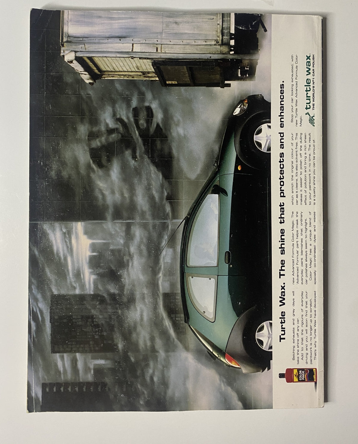 Advertisement for Turtle Wax featured in CAR Magazine June 1997, showcasing the product's benefits for protecting car finishes in a dramatic urban setting.
