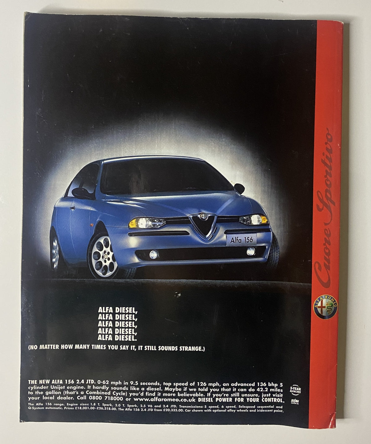 Vintage advertisement for the Alfa Romeo 156 JTD featuring the slogan 'Alfa Diesel'. The promotional image showcases the sleek design of the Alfa 156, highlighting its performance with a top speed of 126 mph and power specifications. This ad is from CAR Magazine in August 1999, which also includes features on Aston DB7 Vantage and Porsche Boxster S.