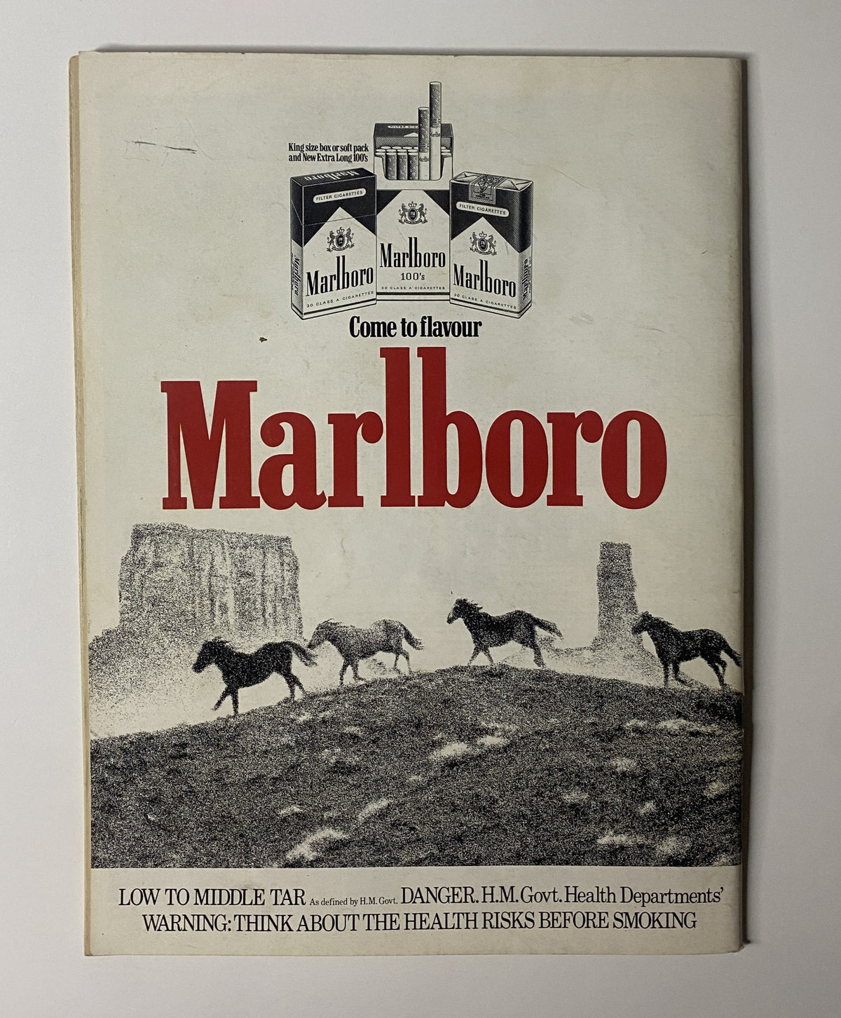 Vintage Marlboro advertisement from Car Magazine January 1983 showcasing a scenic black and white image of horses running with the text 'Come to flavour Marlboro'.