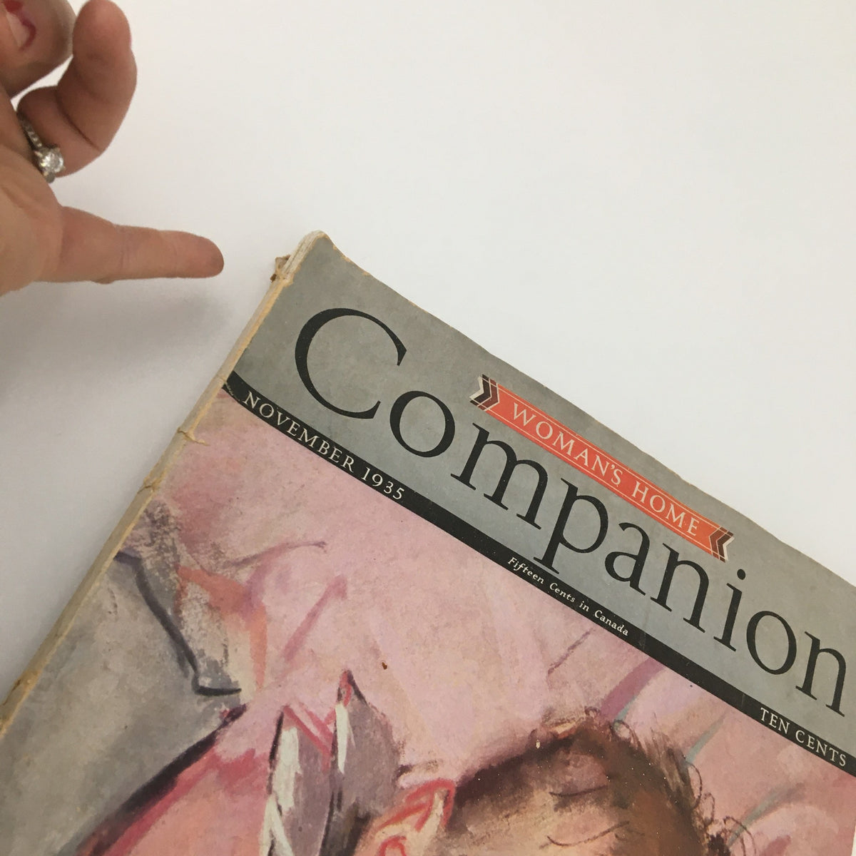 Close-up view of the VTG Woman's Home Companion Magazine, November 1935, showcasing the title and edges, emphasizing its vintage quality.