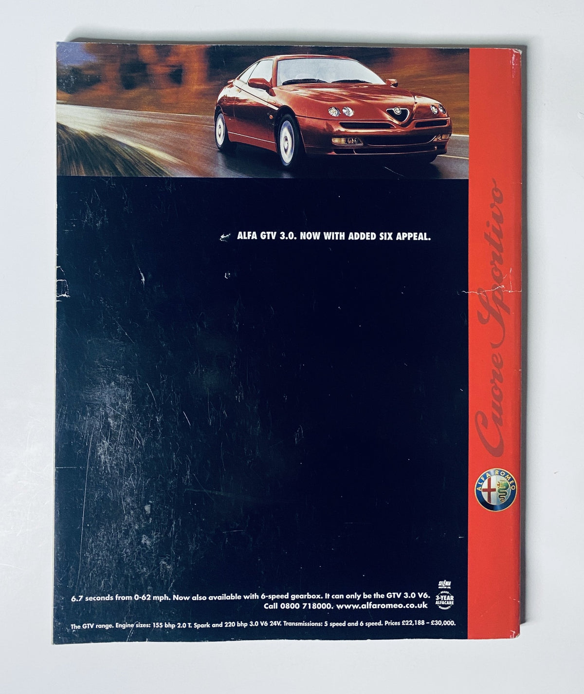 Back cover of Car Magazine July 1999 showcasing the Alfa GTV 3.0 advertisement highlighting its speed and features.