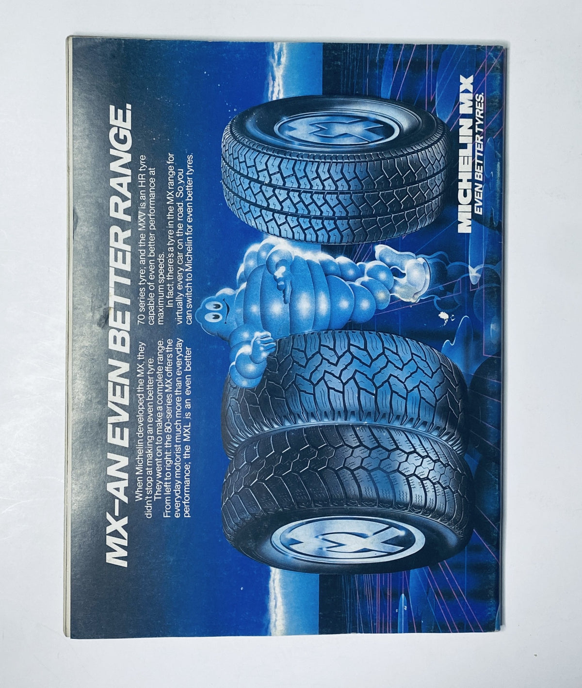 Back cover of Car Magazine August 1984 featuring Michelin tires advertisement with the Michelin Man, emphasizing the brand's commitment to tire quality.