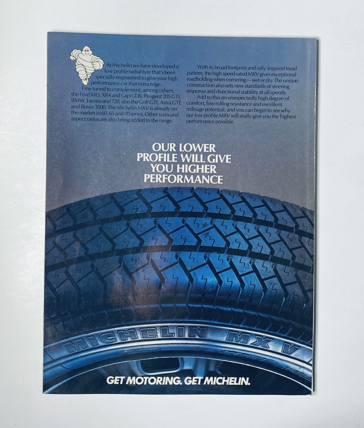 CAR Magazine August 1985 advertisement featuring Michelin tires, promoting their performance benefits. The image highlights a low-profile tire with a focus on enhanced performance, reflecting the automotive themes of the magazine.