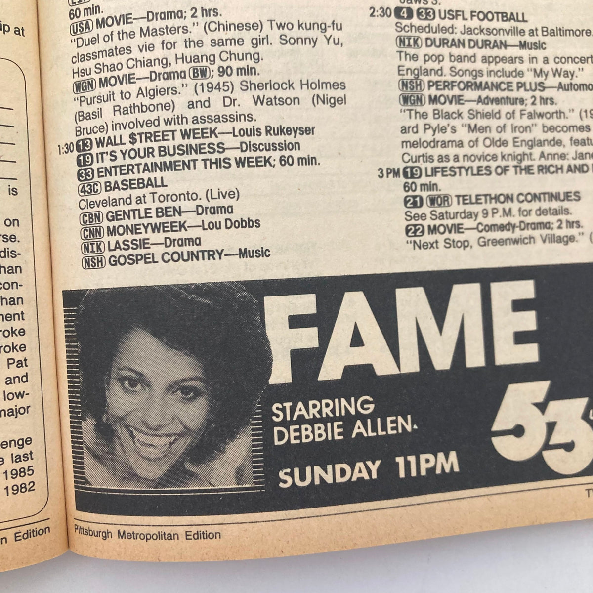 Inside page of TV Guide Magazine June 1 1985 showing the programming schedule including the show Fame starring Debbie Allen, with the Pittsburgh Metropolitan Edition noted.