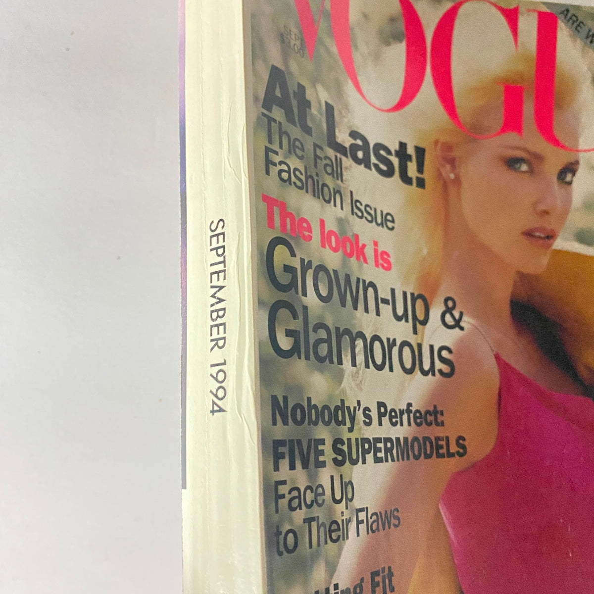 Side view of Vogue Magazine September 1994, displaying the issue date 'SEPTEMBER 1994' and offering a glimpse of the magazine's condition, showcasing its significance in fashion history.