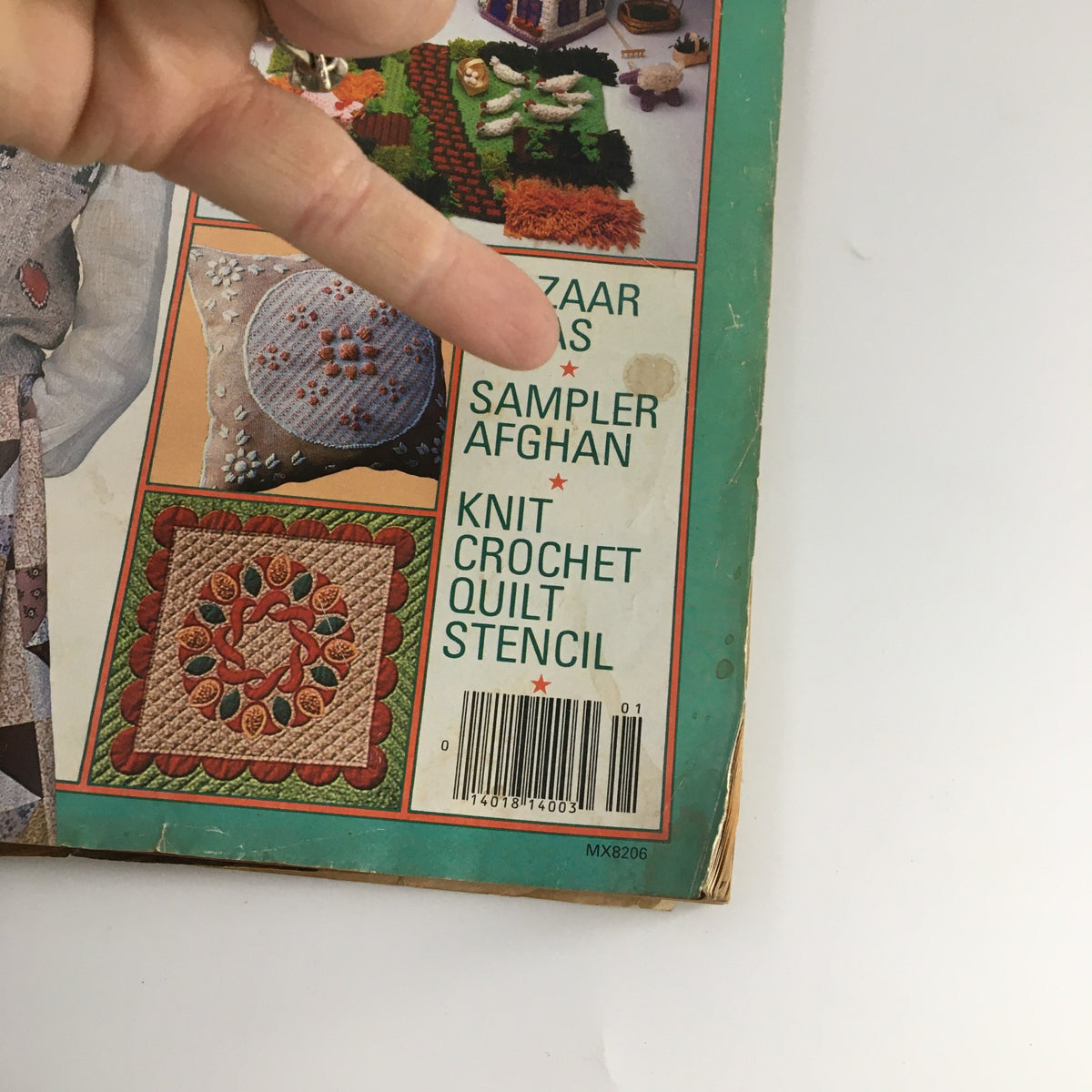 Detail from the back cover of McCall's Needlework & Crafts Magazine February 1983 showcasing Sampler Afghan, Bazaar Ideas, Knit Crochet, Quilt Stencil.