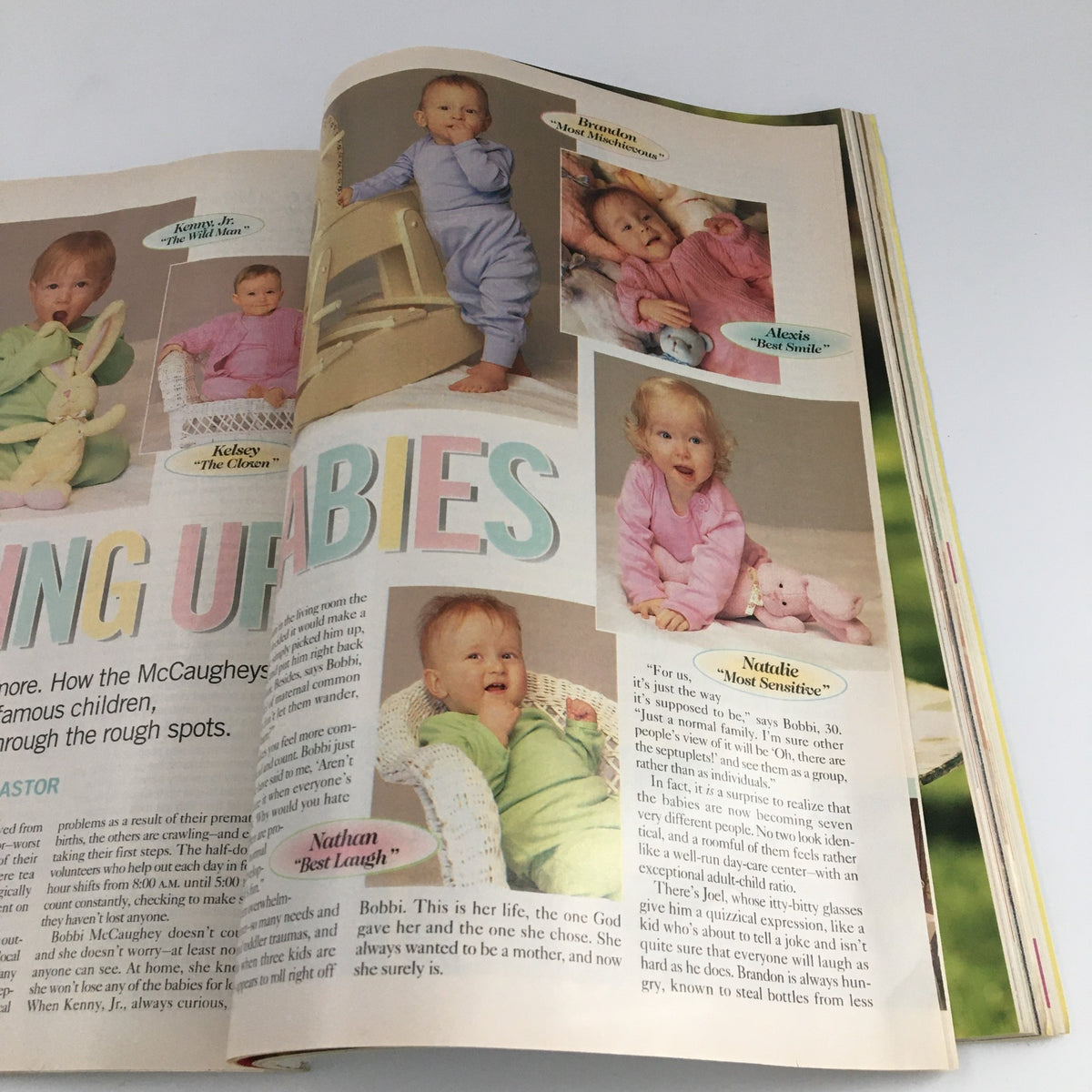 Good Housekeeping Magazine May 1999 interior page showcasing more babies including Nathan and Natalie, with the main focus on the article 'Bringing Up Babies' discussing the lives of the McCaughey septuplets.