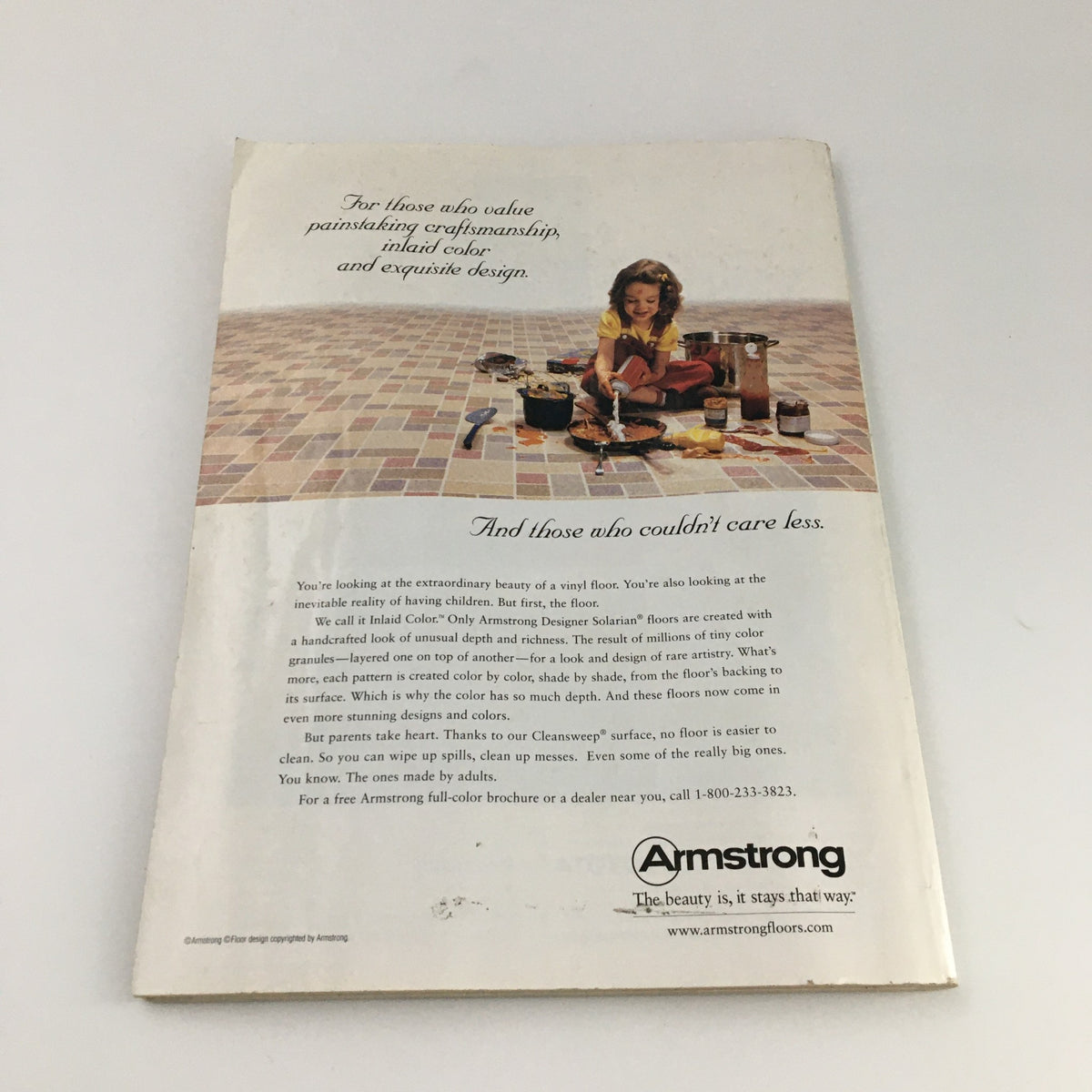 Back cover of Good Housekeeping Magazine May 1999 displaying an advertisement for Armstrong flooring, emphasizing quality and design.