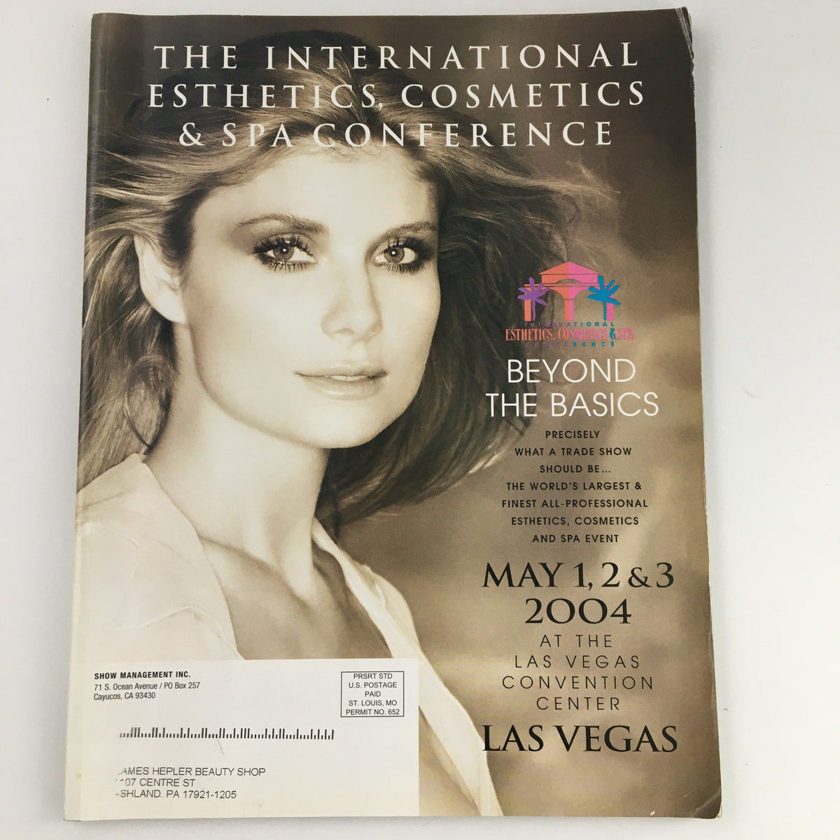 Cover of the Esthetics Cosmetics & Spa International magazine titled 'Beyond The Basics' from May 2004, featuring a model and details about an event in Las Vegas.