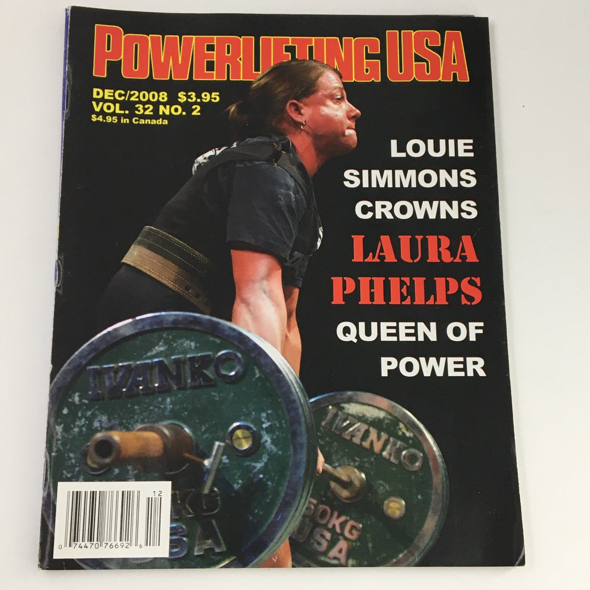 Cover of Powerlifting USA Magazine December 2008 Vol 32 #2 featuring Laura Phelps, crowned Queen of Power by Louie Simmons, showcasing a powerful image indicative of strength sports.