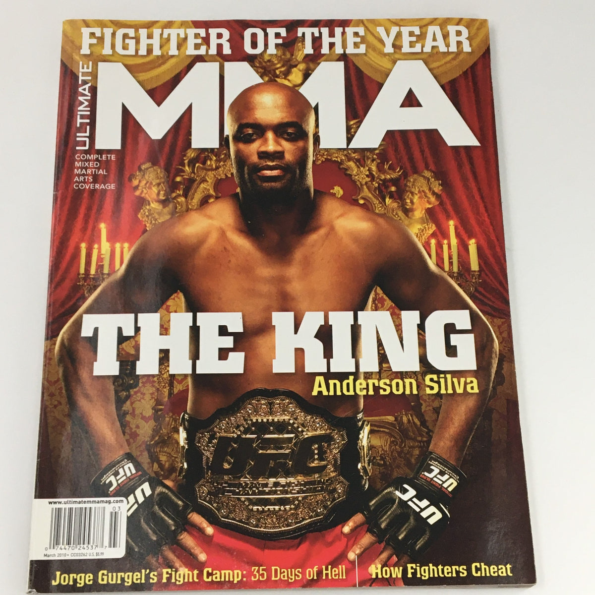 Ultimate MMA Magazine March 2010 issue featuring Anderson Silva on the cover, showcasing him as 'The King' with a championship belt, representing a significant moment in mixed martial arts history.